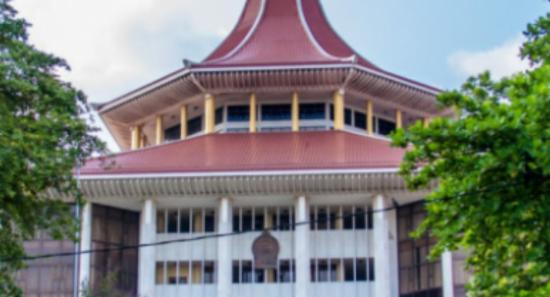 Gold-Colored Gun Case: Woman Released on Bail